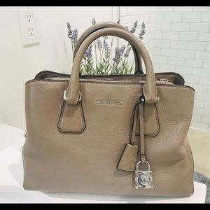 Authentic Michael Kors handbag. Sassy, boxey, beige-goes with everything!